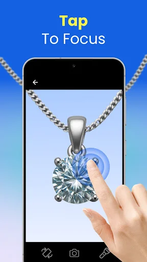 Lupa tap-to-focus feature showing diamond pendant magnified with finger gesture and magnifying glass overlay